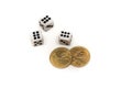 Dice and two commemorative dollars on a white background Royalty Free Stock Photo