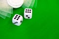 Dice white on green cloth or cloth Royalty Free Stock Photo