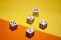 Dice on yellow and orange background