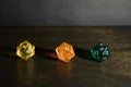 3 dice on a wooden box, gray background