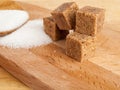 Diced cane sugar and white beet sugar, close-up, consumption of simple sugars Royalty Free Stock Photo