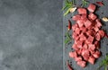 Diced cubed beef meat on stone board Royalty Free Stock Photo