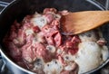 Diced Raw Beef Cooking in Pan Close Up Royalty Free Stock Photo