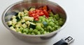 Diced Zucchini Celery and Tomatoes in Metal Bowl Royalty Free Stock Photo