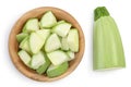 Diced zucchini or marrow in wooden bowl isolated on white background with clipping path and full depth of field. Top Royalty Free Stock Photo