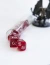 Dices for dnd, role playing games and board games in a transparent tube Royalty Free Stock Photo