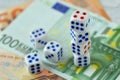 Dices on euro money background - Concept of risky investments and gamble Royalty Free Stock Photo