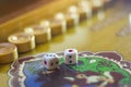 Dices set.Play backgammon table game.Rolling dice in old board game Royalty Free Stock Photo