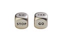 Dices with words Yes No Stop Go on white backgriund