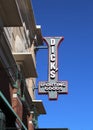 Dick`s Sporting Goods sign against a blue sky