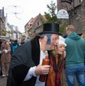 Dickens festival Christmas carol people drunken husband and wife