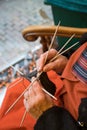 Dickens festival woman knitting Christmas carol