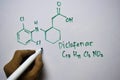 Diclofenac C17,H11,CI2,NO2 molecule written on the white board. Structural chemical formula. Education concept