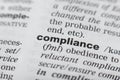 Dictionary definition of the word COMPLIANCE. Close-up shot Royalty Free Stock Photo