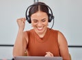 We did it. an attractive young female call center agent cheering while working on her laptop. Royalty Free Stock Photo