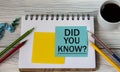 DID YOU KNOW? - words on a note sheet against the background of a cup of coffee, pencils