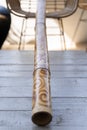 Didgeridoo decorated with abstract design pattern Royalty Free Stock Photo