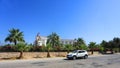 DIDIM, TURKEY - JULY 9, 2014. white car goes on the seafront Hotel on the background