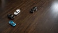 Die cast cars on hardwood flooring of living room Royalty Free Stock Photo