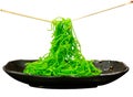 Die cut of Dry Jade Noodle with chopsticks on white isolated