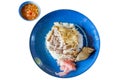 Top view of Roasted duck on rice in a blue plate on white isolated, focus selective Royalty Free Stock Photo