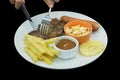 Top view of Steak with Kurobuta Pork Sausage coleslaw, french fried and pineapple, focus selective Royalty Free Stock Photo