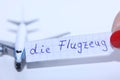 Die Flugzeug word in German for Plane in English Royalty Free Stock Photo