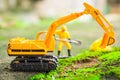 Diecast Construction Toys, Excavator Toys and Construction Worker with Shovel Royalty Free Stock Photo