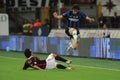 Diego Milito and Alessandro Nesta in action during the match