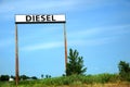 VIntage diesel sign in a blue sky