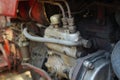 Diesel power engine at old tractor. A fragment of the engine car. Royalty Free Stock Photo