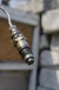 Diesel fuel injector with a drop of fuel Royalty Free Stock Photo