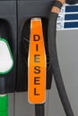 Diesel fuel nozzle at gas station Royalty Free Stock Photo