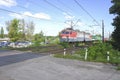 Diesel locomotive VL10 carries cargo wagons. Sunny summer view. Royalty Free Stock Photo