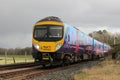 Diesel multiple unit train at Arnside in Cumbria