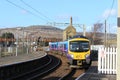 Diesel multiple unit train arriving at station