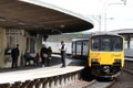 Diesel multiple unit train at curved platform