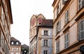 Diesse Tower clock tower among old buildings in Medieval ancient town of Neuchatel Royalty Free Stock Photo