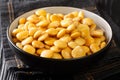 Diet appetizer pickled lupine beans close-up in a bowl. horizontal