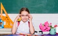 Diet. back to school. Einstein. healthy eating is good. digital age with modern technology. small girl ready to eat Royalty Free Stock Photo