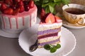 Diet cake with berry fillings, multi-colored striped with rice flour decorated with ripe strawberries