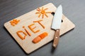 Diet concept. design food. word diet carrots on a cutting board