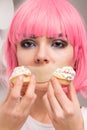 The diet concept. girl with taped mouth with sweets Royalty Free Stock Photo