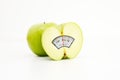 Diet concept with green apples and weight scale