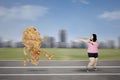 Obese woman escaping from a fried chicken