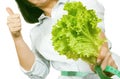 Diet Concept. Young Woman with Lettuce Measuring Her Waistline w Royalty Free Stock Photo