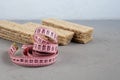 Diet crispbread with bran on a light background. Near a centimeter and homemade yogurt. The concept of losing weight. Healthy Royalty Free Stock Photo