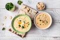 Diet detox food concept. Healthy broccoli cream soup in bowl on light background. Food recipe background. Close up Royalty Free Stock Photo