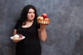 Diet, dieting concept, healthy food. Beautiful young overweight Royalty Free Stock Photo