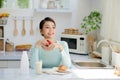 Diet. Dieting concept. Healthy Food. Beautiful Young Woman choosing between Fruits and Sweets Royalty Free Stock Photo